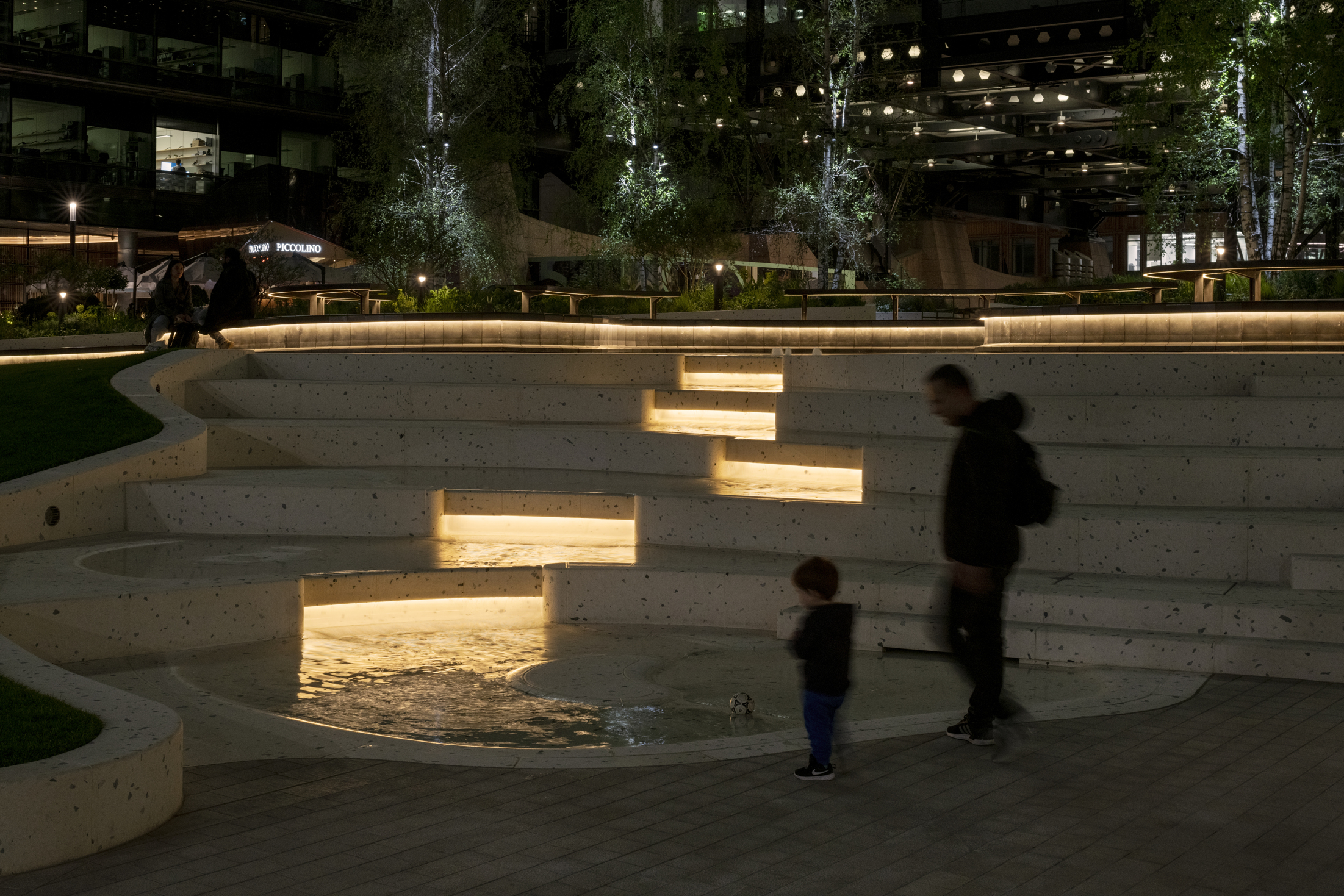 Exchange Square turns a change of level into an evening focal point.