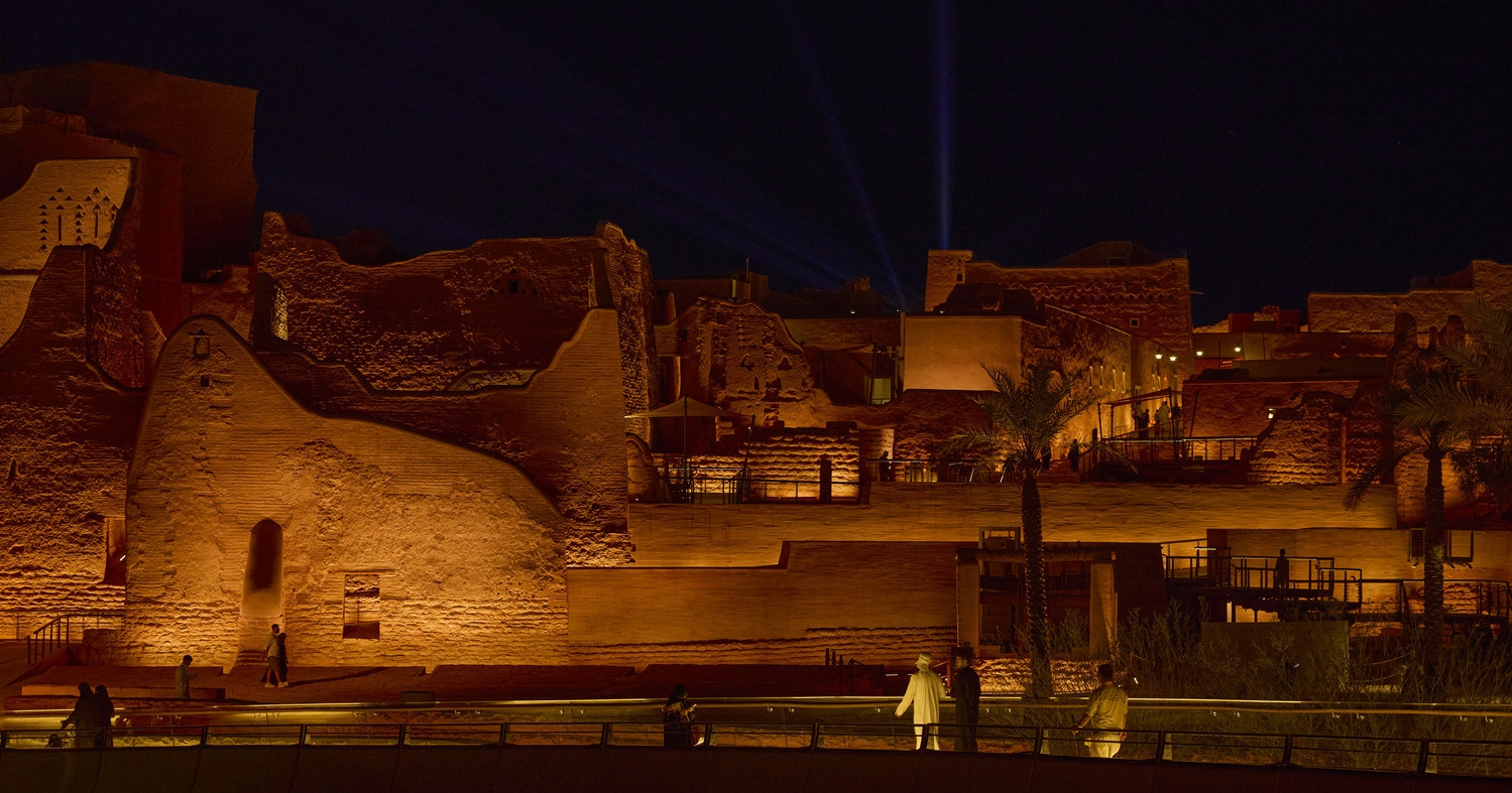 At-Turaif’s earth-coloured walls become a landscape of depth and shadow.